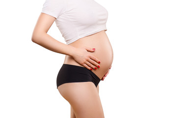 pregnant woman touching her belly, love