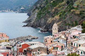 View from high hill on Vernazza houses and blue sea, Cinque Terre national park, Liguria, Italy