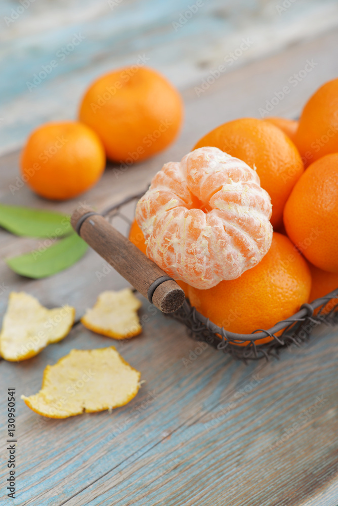 Wall mural Tangerines in metal basket