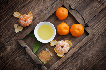 Tangerine essential oil in a glass bottle