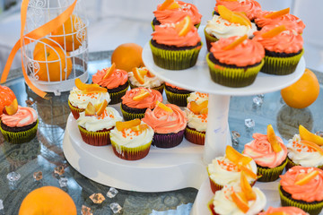 Wedding cake with red roses. orange