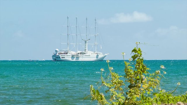 Windstar Wind Spirit Luxury Sailboat Cruise Ship Anchored at Moorea Irsland in Exotic French Polynesia