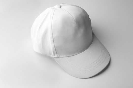 Blank baseball cap on white background