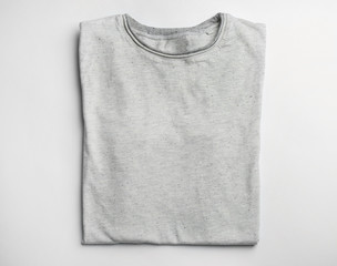 Blank grey t-shirt on white background