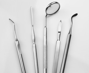 Dentist medical tools on white background