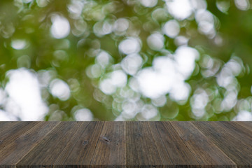 Abstract bokeh of nature with wood terrace
