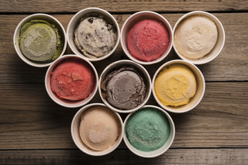 Top view Ice cream flavors in cup on blackground