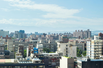 Fototapeta premium Business and culture concept - panoramic modern city skyline bird eye aerial view under dramatic morning blue cloudy sky in Taiwan