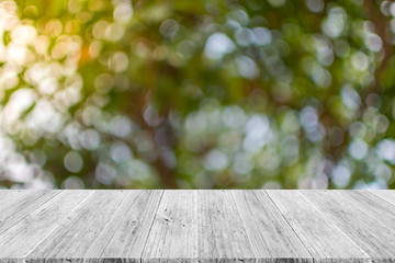 Abstract bokeh nature with wood terrace