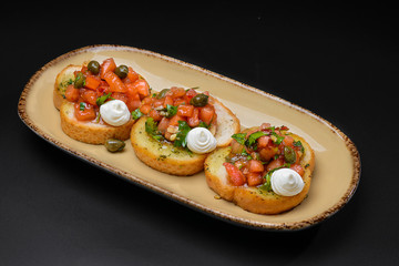 Toasts with tomatoes
