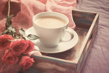 Cup of coffee, cookies and rose. Concept of Valentine's Day brea