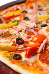 Delicious pizza on wooden tray