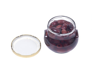 Cut beets in vinaigrette in jar isolated on white background