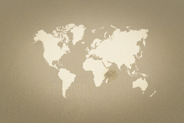 Fototapeta na wymiar Sand texture surface with world map