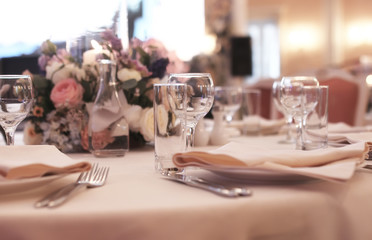 Wine glasses on the table served for the reception in the restau