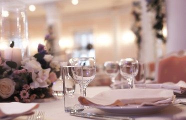Wine glasses on the table served for the reception in the restau