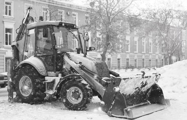 snow machine with a bucket outdoor street city