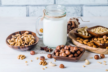Vegan milk from nuts in glass jar 