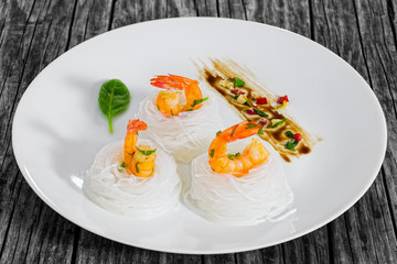 fried shrimps Salad rice Noodle Nest, close-up