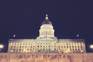 Vintage toned picture of Utah State Capitol building in Salt Lake City at night, USA.