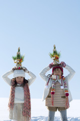 門松を持つ女の子