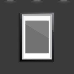 Vertical frame on gray wall with realistic shadows and light spo