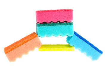Multicolored sponges of of foam rubber for washing dishes isolated on white background