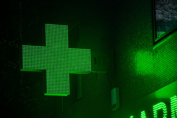 pharmacy sign in winter night