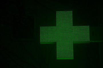 pharmacy sign in winter night
