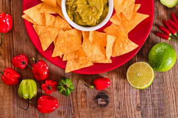 Guacamole and nacho chips. 