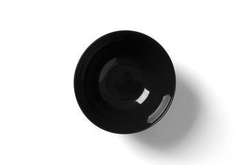 Black empty plate isolated