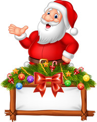 Cartoon Santa Claus posing with decorated banner