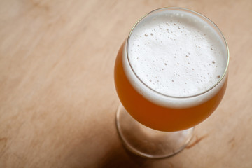 Wheat beer on wood