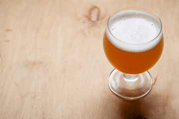 Wheat beer on wood