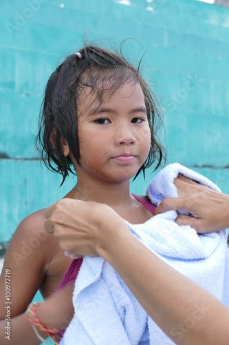 Asian Little Girl With Wet Hair From Swimming Fotos De A