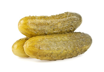 Pickled cucumbers on white background