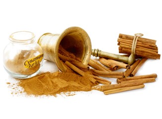 cinnamon barks and powder with montar