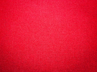 Old style red textile. Denim design background. Industry red fabric beautiful. Texture original textile pattern. Fabric red. Super vintage fabric material. Red textile macro. 