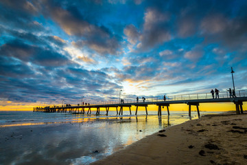 People on Glenelg Beach jetty