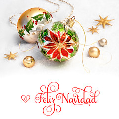 Christmas baubles with poinsettia on snow, text