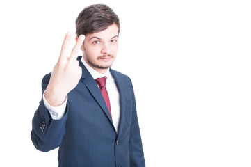 Marketing manager showing number two with hand