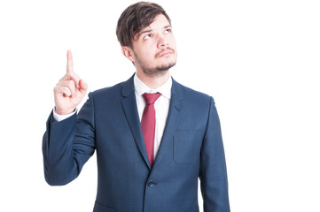 Marketing man showing idea gesture or looking up