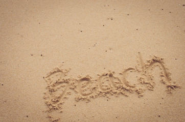 Copy space of  Beach words on sand beach. Travel concept.