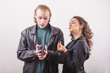 Spoiled wife waiting for her husband to give her money