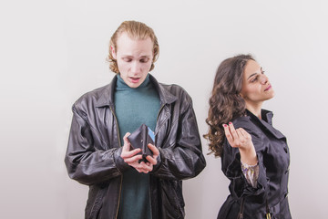 Spoiled wife waiting for her husband to give her money