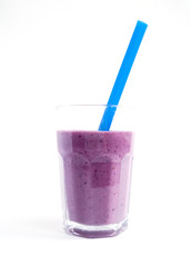 BlackBerry Smoothie in a glass beaker on a white background with purple tubes