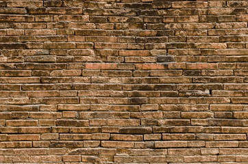 Fototapeta premium Old grunge brown stone brick wall texture abstract background.