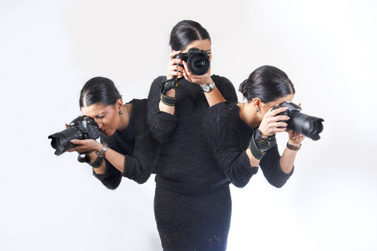 Multitasking woman photographer