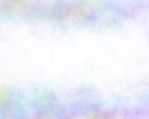 Abstract white bokeh on colorful background.