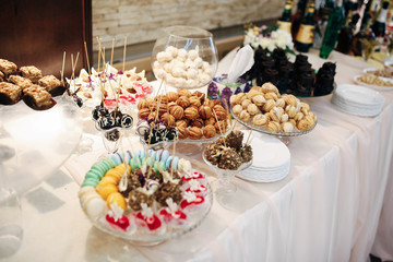 The cakes stand on the buffet table
